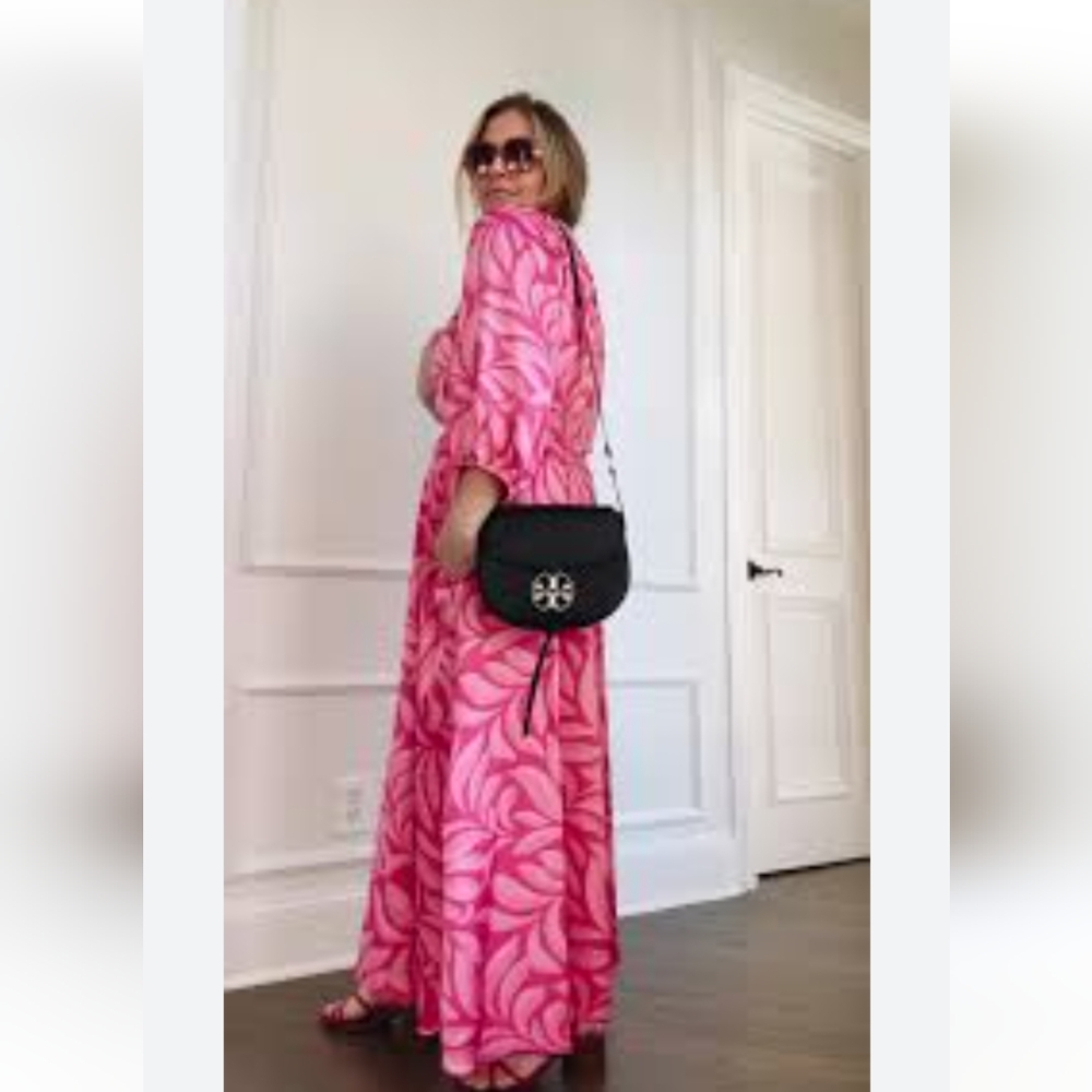 Taylor pink floral Barbie dress with cutouts at the waistband.  V neck with puff
